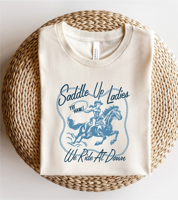 Saddle Up Ladies We Ride At Dawn | Graphic Tee